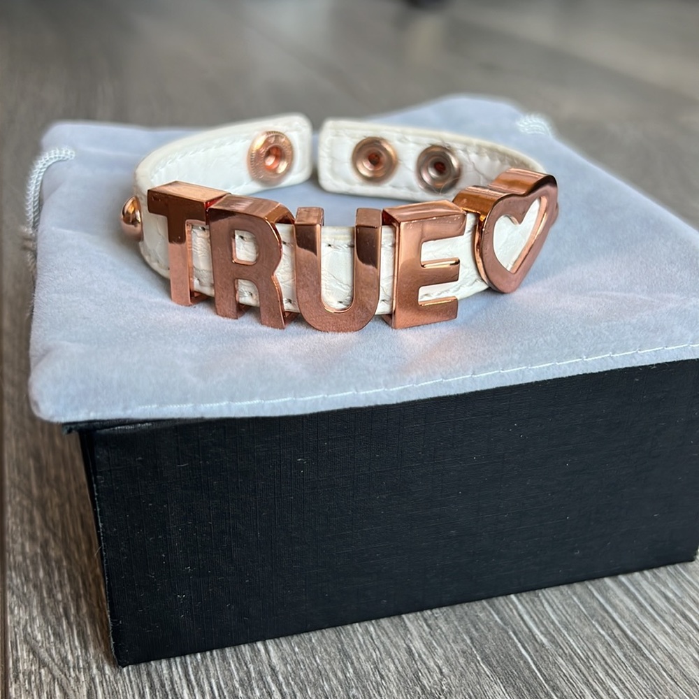 BCBGeneration True Love White Faux Leather Snap Bracelet With Rose Gold Letters